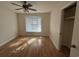 Bedroom with hardwood flooring and a bay window at 902 N 11Th Ave. N, North Myrtle Beach, SC 29582