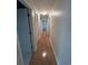 Hallway with hardwood floors leading to rooms at 902 N 11Th Ave. N, North Myrtle Beach, SC 29582