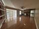 Spacious living room featuring hardwood floors and stone fireplace at 902 N 11Th Ave. N, North Myrtle Beach, SC 29582