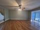 Spacious living room with hardwood floors and a bay window at 902 N 11Th Ave. N, North Myrtle Beach, SC 29582