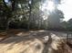 Residential lot featuring mature trees and concrete pad at 902 N 11Th Ave. N, North Myrtle Beach, SC 29582