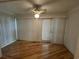 Sunroom with hardwood floors and vertical blinds at 902 N 11Th Ave. N, North Myrtle Beach, SC 29582