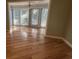 Sunroom with hardwood floors and lots of natural light at 902 N 11Th Ave. N, North Myrtle Beach, SC 29582