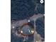 Aerial shot of a home on a spacious lot, bordered by trees and conveniently located near major roads at 2000 Easy St., Conway, SC 29526