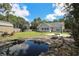 Backyard oasis with a serene pond, picnic area, and basketball court for Gathering fun at 2000 Easy St., Conway, SC 29526