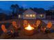 Cozy backyard with a fire pit and a basketball court, perfect for outdoor gatherings at 2000 Easy St., Conway, SC 29526