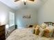 Bedroom featuring a bed with patterned bedding, a bright window, and hardwood floors at 2000 Easy St., Conway, SC 29526