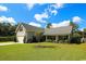 Inviting home featuring a manicured lawn, attached garage, and charming curb appeal at 2000 Easy St., Conway, SC 29526
