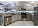 Open concept kitchen featuring stainless steel appliances, granite counters and a breakfast bar at 2000 Easy St., Conway, SC 29526
