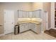 This cozy kitchenette offers lots of countertop space, storage, and entry doors to other rooms at 2000 Easy St., Conway, SC 29526
