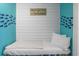 Cozy bedroom area featuring a comfortable daybed with coastal themed decorations at 5905 S Kings Hwy. # 231, Myrtle Beach, SC 29577