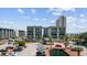 Multi-story building with balconies, palm trees, and parking in a desirable location near the beach at 5905 S Kings Hwy. # 231, Myrtle Beach, SC 29577
