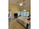 Bright bedroom with vaulted ceiling, ample light, wood-look flooring, and coastal accents at 674 Riverwalk Dr. # 301, Myrtle Beach, SC 29579