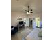 Inviting bedroom with a comfortable chair, mirrored closet doors, and neutral tones at 674 Riverwalk Dr. # 301, Myrtle Beach, SC 29579