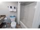 Functional bathroom with a toilet, vanity, and shower/tub combo with neutral colors at 6900 N Ocean Blvd. # 405, Myrtle Beach, SC 29572