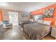 Charming main bedroom featuring two beds, a comfortable chair, and tasteful decor at 6900 N Ocean Blvd. # 405, Myrtle Beach, SC 29572