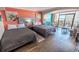 Inviting main bedroom featuring two beds, a cozy seating area, and access to a private balcony at 6900 N Ocean Blvd. # 405, Myrtle Beach, SC 29572