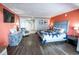 Tastefully decorated main bedroom with a comfortable queen bed, a TV and ample space at 6900 N Ocean Blvd. # 405, Myrtle Beach, SC 29572