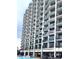 Condo building featuring multiple floors of balconies at 7100 N Ocean Blvd. # 819, Myrtle Beach, SC 29572