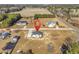 Aerial view of the house in a rural community with lots of trees and vegetation at 107 Deans Ct., Green Sea, SC 29545