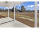 Covered back porch overlooking a large backyard at 107 Deans Ct., Green Sea, SC 29545