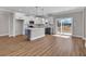 Open floor plan kitchen featuring a large island, stainless appliances, white and gray cabinets, and lots of counter space at 107 Deans Ct., Green Sea, SC 29545
