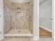 Shower features decorative tiled walls with built in niche at 107 Deans Ct., Green Sea, SC 29545