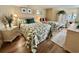 Comfortable bedroom with two beds, green and red accents, and closet at 2504 N Ocean Blvd. # 734, Myrtle Beach, SC 29577