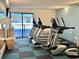 Well-equipped gym with cardio machines overlooking a balcony, providing a perfect workout view at 2504 N Ocean Blvd. # 734, Myrtle Beach, SC 29577