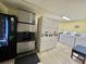 Clean laundry facility featuring multiple washers, dryers, a vending machine, and convenient amenities at 2504 N Ocean Blvd. # 734, Myrtle Beach, SC 29577