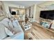 Inviting living room with modern furnishings, wood floors and a view into the kitchen at 2504 N Ocean Blvd. # 734, Myrtle Beach, SC 29577