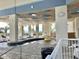 Relaxing indoor pool and hot tub area with lounge chairs and ocean views beyond at 2504 N Ocean Blvd. # 734, Myrtle Beach, SC 29577