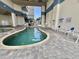 Inviting outdoor pool area with lounge chairs and modern architectural design; perfect for relaxation at 2504 N Ocean Blvd. # 734, Myrtle Beach, SC 29577