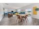 Spacious room connecting living and dining areas, bathed in natural light at 128 Caveson Way, Conway, SC 29526