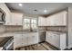 Kitchen with granite countertops, white cabinets and stainless steel appliances at 2970 New Home Circle, Conway, SC 29526