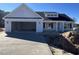 Newly constructed home with attached garage and neutral siding at 8187 Kerl Rd., Conway, SC 29526