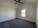 Bright bedroom with a ceiling fan and a window at 1248 Wehler Ct., Conway, SC 29526