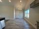 Bright dining area with light-colored tiled flooring and natural light from a large window at 1248 Wehler Ct., Conway, SC 29526