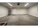 Well-lit, large garage featuring concrete floor, plenty of space, and a utility water heater at 1248 Wehler Ct., Conway, SC 29526