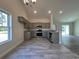 Modern kitchen featuring gray cabinetry, stainless steel appliances, and stone countertops at 1248 Wehler Ct., Conway, SC 29526