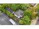 Aerial view of the property with ample parking, mature trees, and well-maintained landscaping at 412 29Th Ave. N, Myrtle Beach, SC 29577