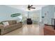 Cozy living room with comfortable seating, light blue walls, and natural light from several windows at 6001 - N14 S Kings Hwy., Myrtle Beach, SC 29575