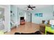 Inviting living room with ceiling fan, comfortable sofa, light wood floors, and coastal decor at 6001 - N14 S Kings Hwy., Myrtle Beach, SC 29575