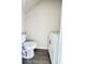 Compact half bathroom featuring a modern vanity and toilet, perfect for guests and everyday convenience at 6306 Somerset Dr., Myrtle Beach, SC 29572