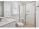 A stylish bathroom with modern fixtures, a glass-enclosed shower, and a vanity at 512 9Th Ave. S, North Myrtle Beach, SC 29582