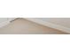 Close-up on neutral color bedroom carpet and white baseboard trim at 512 9Th Ave. S, North Myrtle Beach, SC 29582