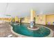 Indoor pool with a center water feature at 2000 N Ocean Blvd. # 1601, Myrtle Beach, SC 29577