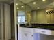Bathroom featuring a vanity with an expansive mirror and a separate shower area at 4290 Pinehurst Circle # B6, Little River, SC 29566