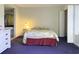 Bright bedroom with soft lighting, comfortable bedding, and a dressing area at 4290 Pinehurst Circle # B6, Little River, SC 29566