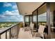 Relax on this expansive balcony with lounge chairs, offering panoramic views of the surrounding area at 9650 Shore Dr. # 1805, Myrtle Beach, SC 29572